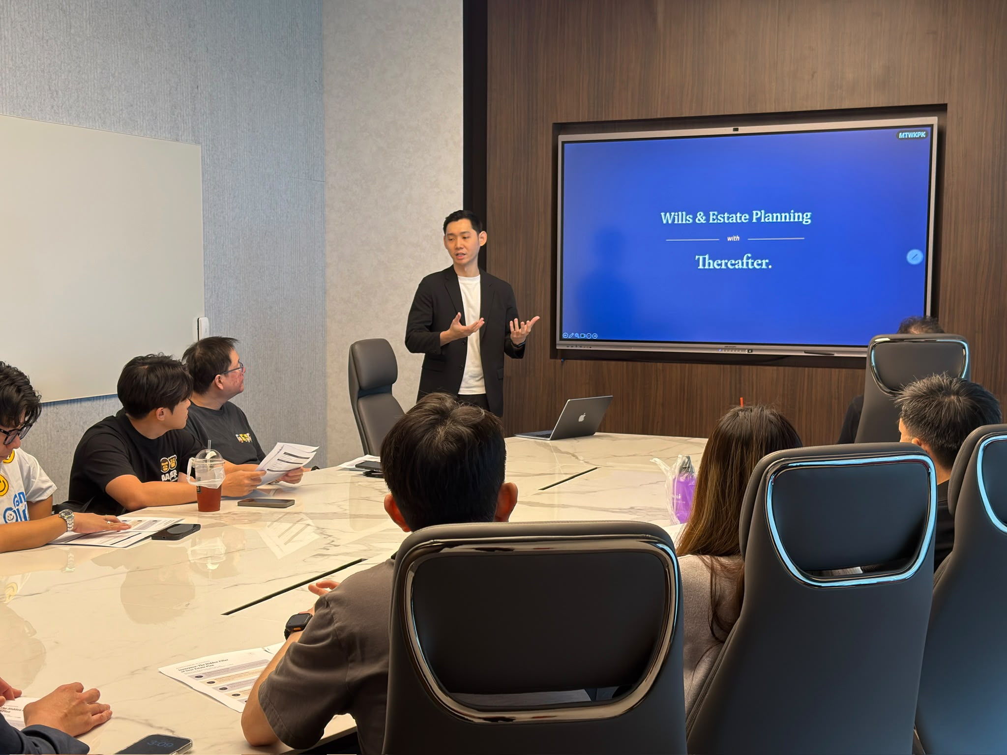 Speaker opening the boardroom sharing session